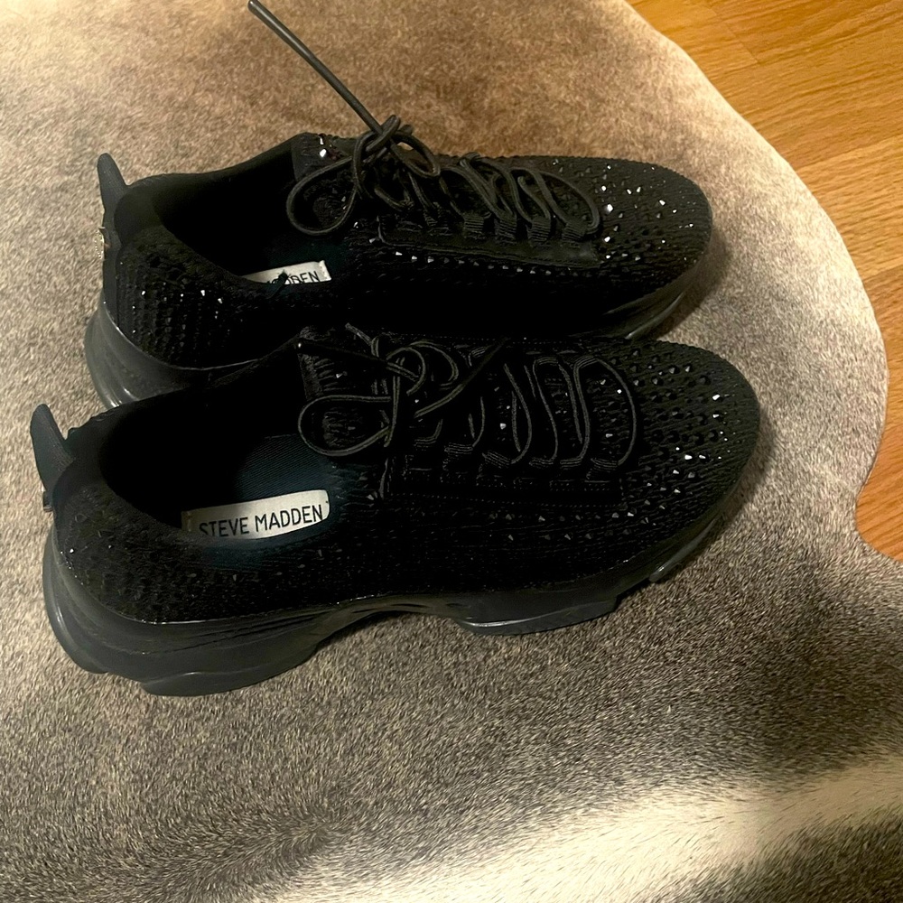 These are Steve Madden studded sneakers size 8.5, but fit more like an 8